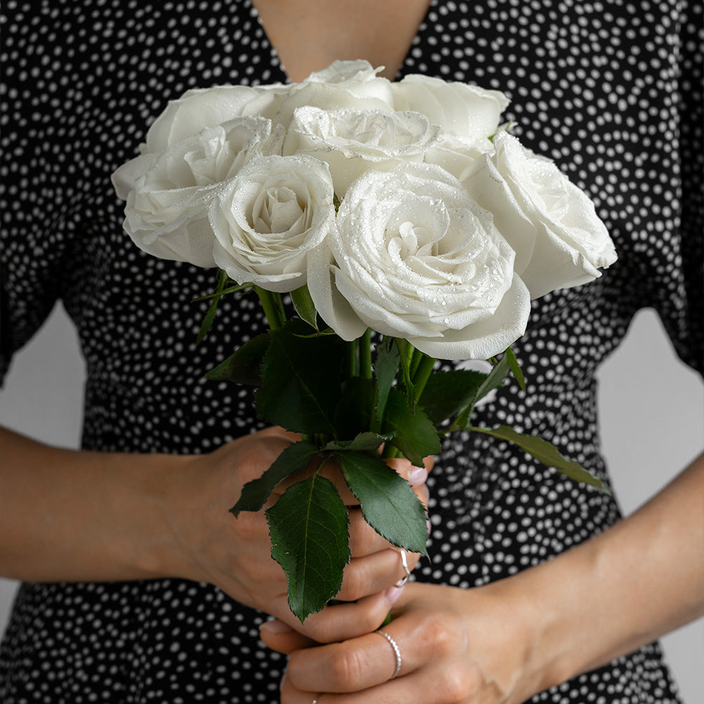Sympathy bouquet of white roses