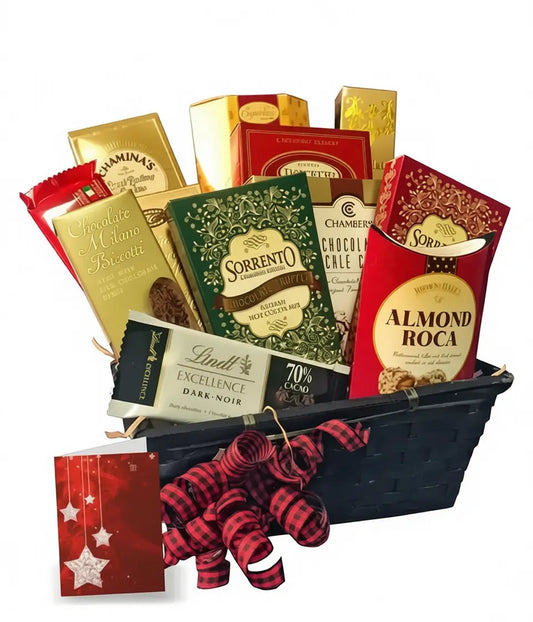 Christmas chocolate gift basket with Almond Roca, Lindt, and assorted sweets in a black basket with red ribbon.
