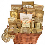 Luxury holiday gift basket with caramel popcorn, cookies, truffles, and assorted snacks in a gold-themed wicker basket.